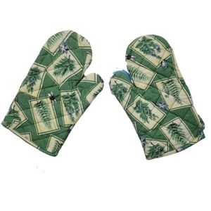Vintage pair of oven mitts plant print